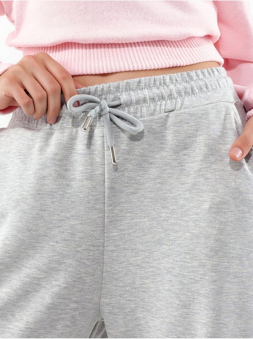 Pantalon en maille taille haute et jambes larges busem - Kiabi Pantalon en maille taille haute et jambes larges busem - Kiabi