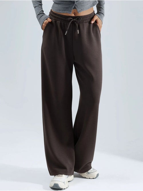 Pantalon en maille taille haute et jambes larges busem - Kiabi Pantalon en maille taille haute et jambes larges busem - Kiabi