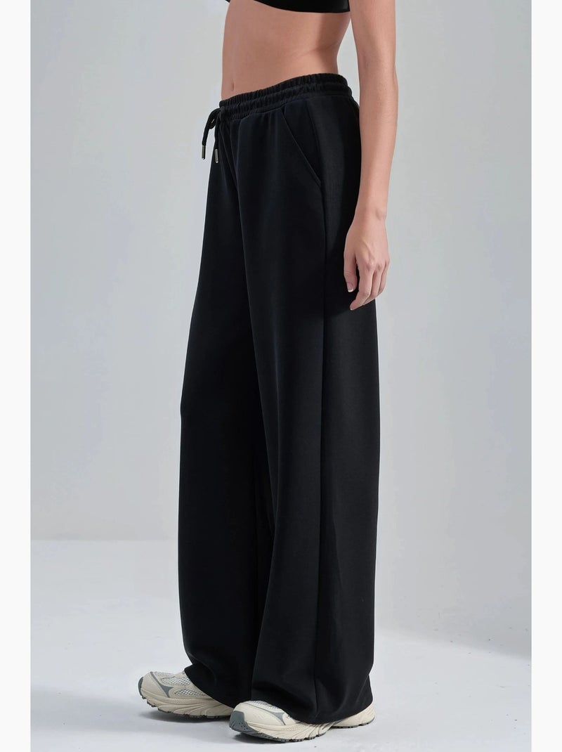 Pantalon en maille taille haute et jambes larges busem Noir - Kiabi