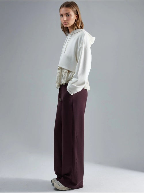 Pantalon en maille taille haute et jambes larges busem - Kiabi Pantalon en maille taille haute et jambes larges busem - Kiabi