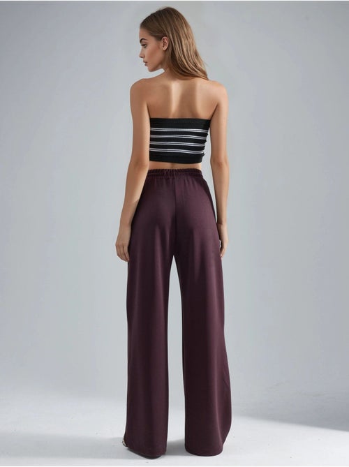 Pantalon en maille taille haute et jambes larges busem - Kiabi Pantalon en maille taille haute et jambes larges busem - Kiabi