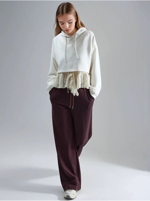 Pantalon en maille taille haute et jambes larges busem - Kiabi Pantalon en maille taille haute et jambes larges busem - Kiabi