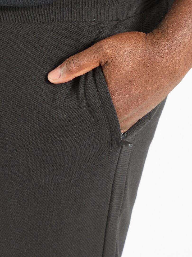 Pantalon en piqué de coton noir - Kiabi
