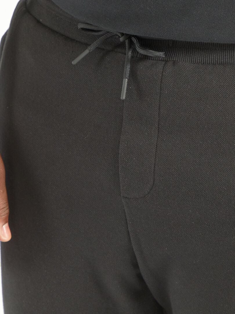 Pantalon en piqué de coton noir - Kiabi