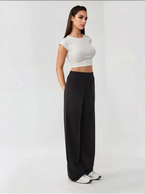 Pantalon en tricot à jambes larges avec taille élastique - Kiabi Pantalon en tricot à jambes larges avec taille élastique - Kiabi