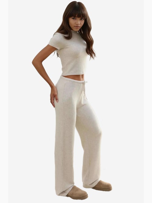 Pantalon en tricot doux et texturé avec cordons hiccup - Kiabi Pantalon en tricot doux et texturé avec cordons hiccup - Kiabi