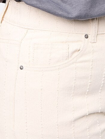Pantalon en twill avec abrasions fantaisies verticales