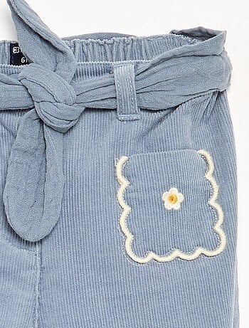 Pantalon en velours avec poches brodées