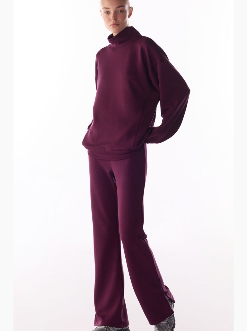 Pantalon évasé à détail au bas de jambe, toucher soyeux penti Rouge bordeaux - Kiabi