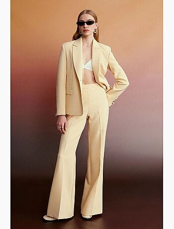Pantalon évasé à taille haute et plis dilvin