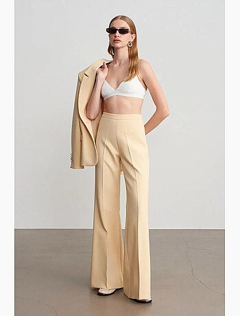 Pantalon évasé à taille haute et plis dilvin