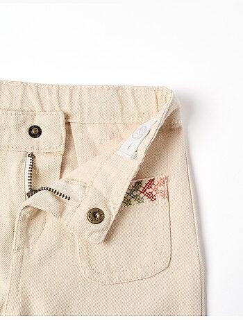 Pantalon évasé en sergé avec broderie