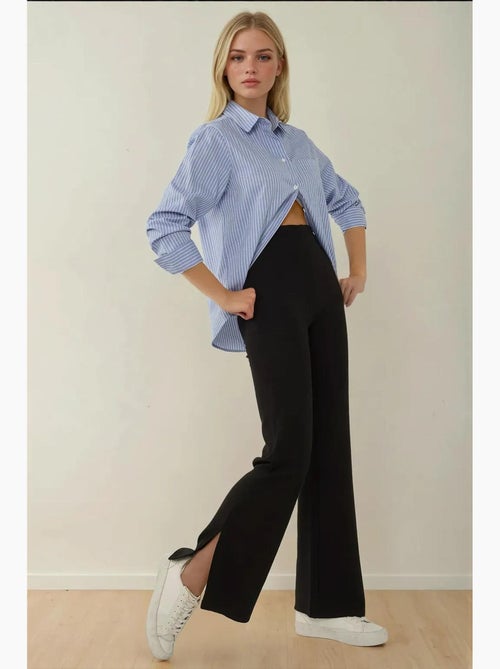 Pantalon évasé taille haute avec fente hiccup - Kiabi Pantalon évasé taille haute avec fente hiccup - Kiabi