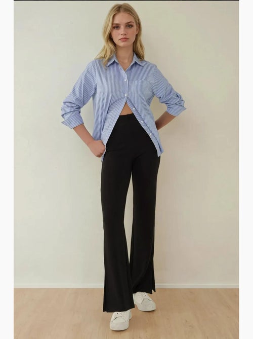 Pantalon évasé taille haute avec fente hiccup - Kiabi Pantalon évasé taille haute avec fente hiccup - Kiabi