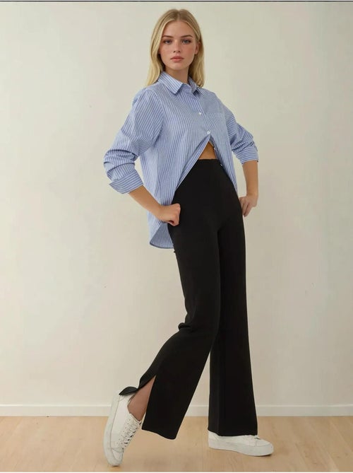 Pantalon évasé taille haute avec fente - Kiabi Pantalon évasé taille haute avec fente - Kiabi