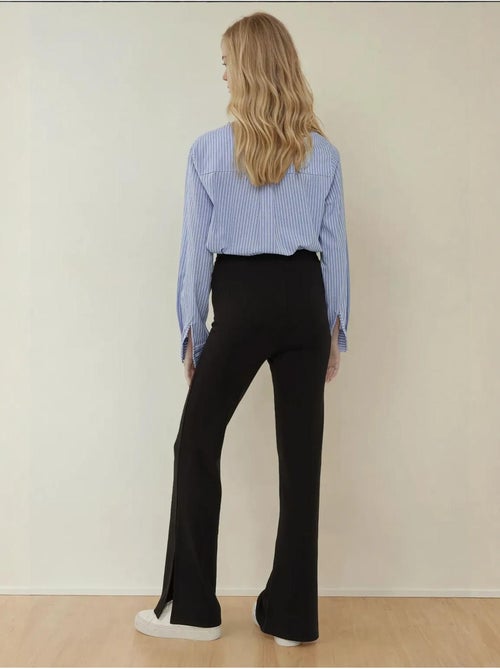 Pantalon évasé taille haute avec fente - Kiabi Pantalon évasé taille haute avec fente - Kiabi