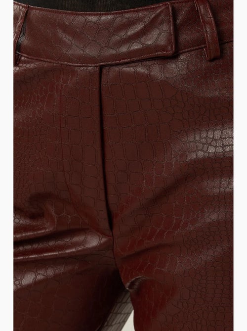 Pantalon évasé taille haute en simili cuir hiccup - Kiabi Pantalon évasé taille haute en simili cuir hiccup - Kiabi