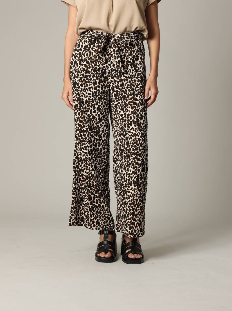 Pantalon femme en polyester gaufré à motif léopard 'Deeluxe' Beige - Kiabi