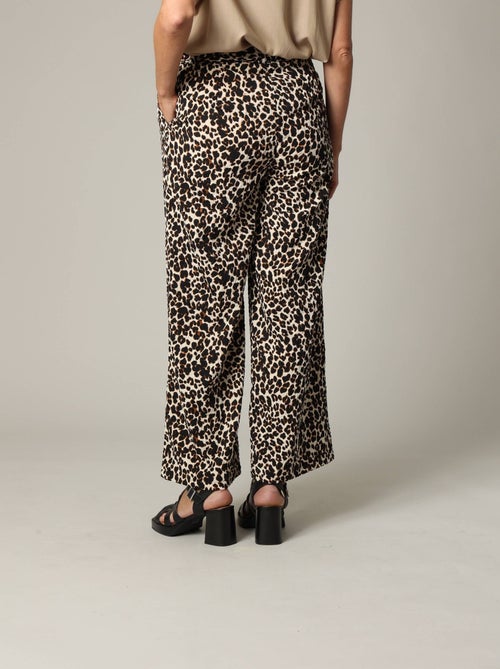 Pantalon femme en polyester gaufré à motif léopard 'Deeluxe' - Kiabi