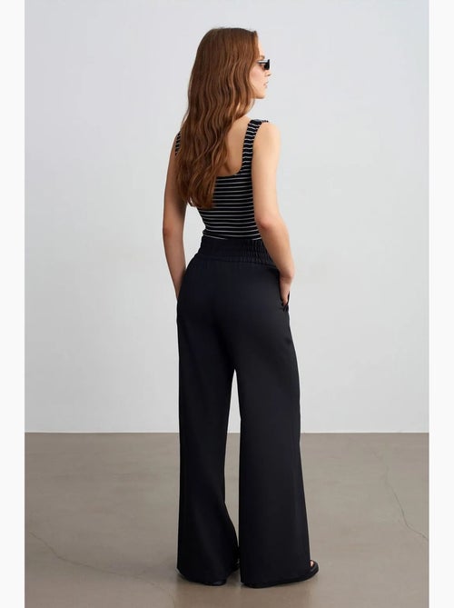 Pantalon femme large en crêpe dilvin - Kiabi
