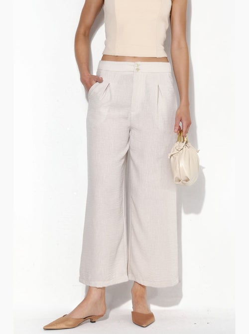 Pantalon femme taille haute à jambe large busem - Kiabi Pantalon femme taille haute à jambe large busem - Kiabi