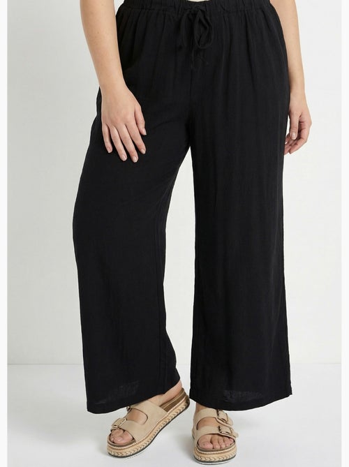 Pantalon fluide avec lin, effet naturel - AFIBEL - Kiabi Pantalon fluide avec lin, effet naturel - AFIBEL - Kiabi