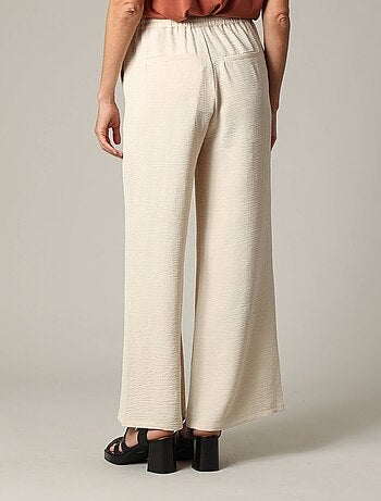 Pantalon fluide en tissu texturé avec taille élastiquée et double couture verticale 'Deeluxe'