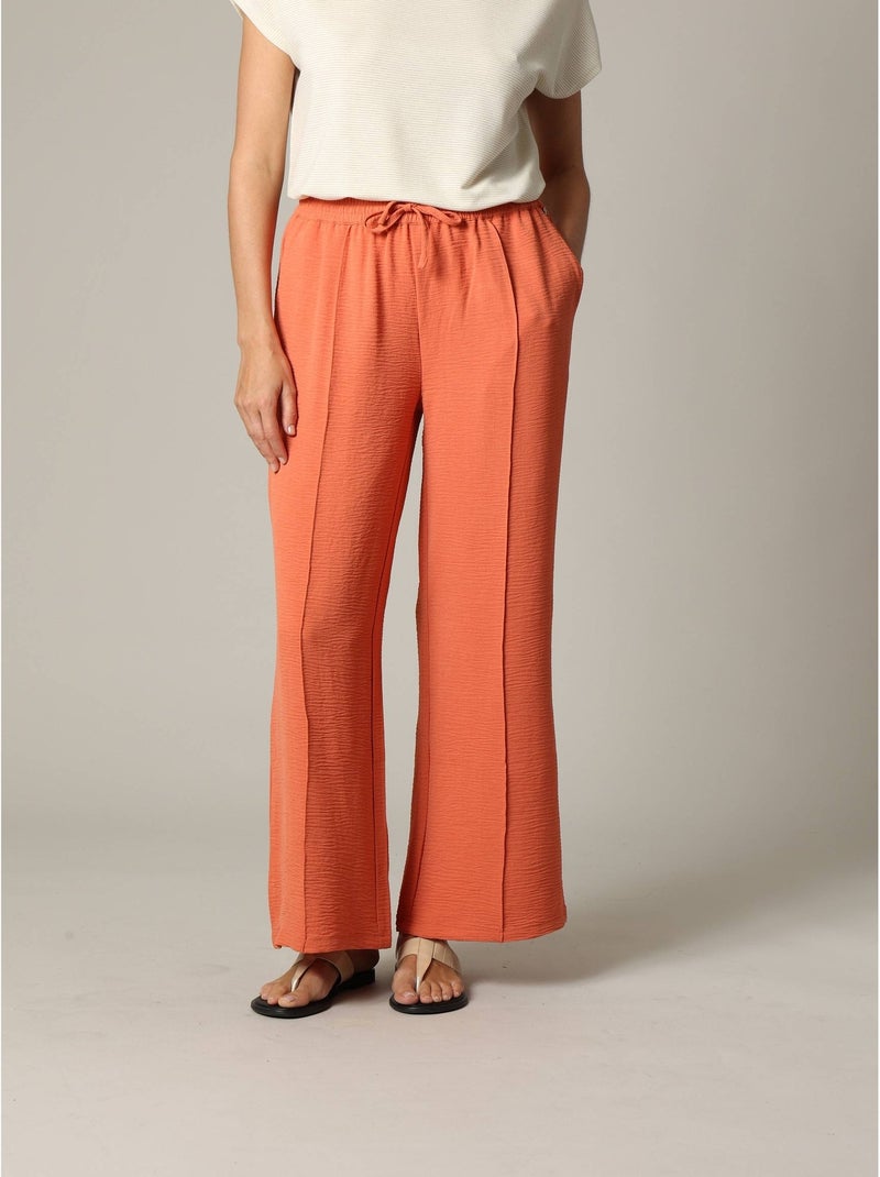 Pantalon fluide en tissu texturé avec taille élastiquée et double couture verticale 'Deeluxe' Rouge brique - Kiabi