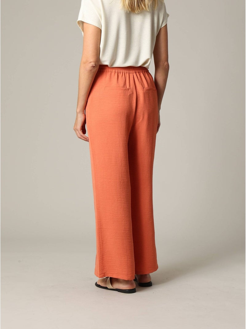 Pantalon fluide en tissu texturé avec taille élastiquée et double couture verticale 'Deeluxe' Rouge brique - Kiabi