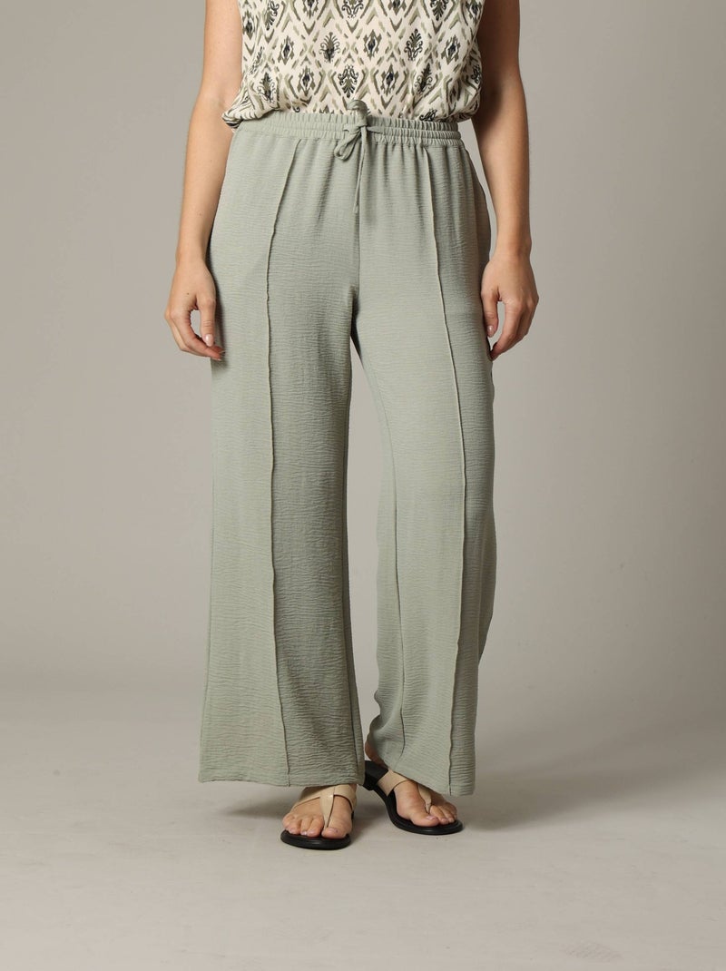 Pantalon fluide en tissu texturé avec taille élastiquée et double couture verticale 'Deeluxe' Vert tilleul - Kiabi