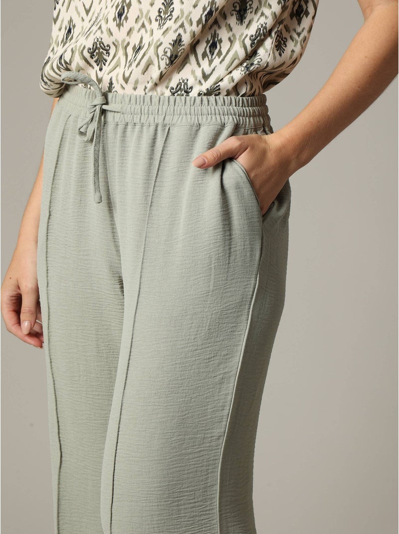 Pantalon fluide en tissu texturé avec taille élastiquée et double couture verticale 'Deeluxe' Vert tilleul - Kiabi
