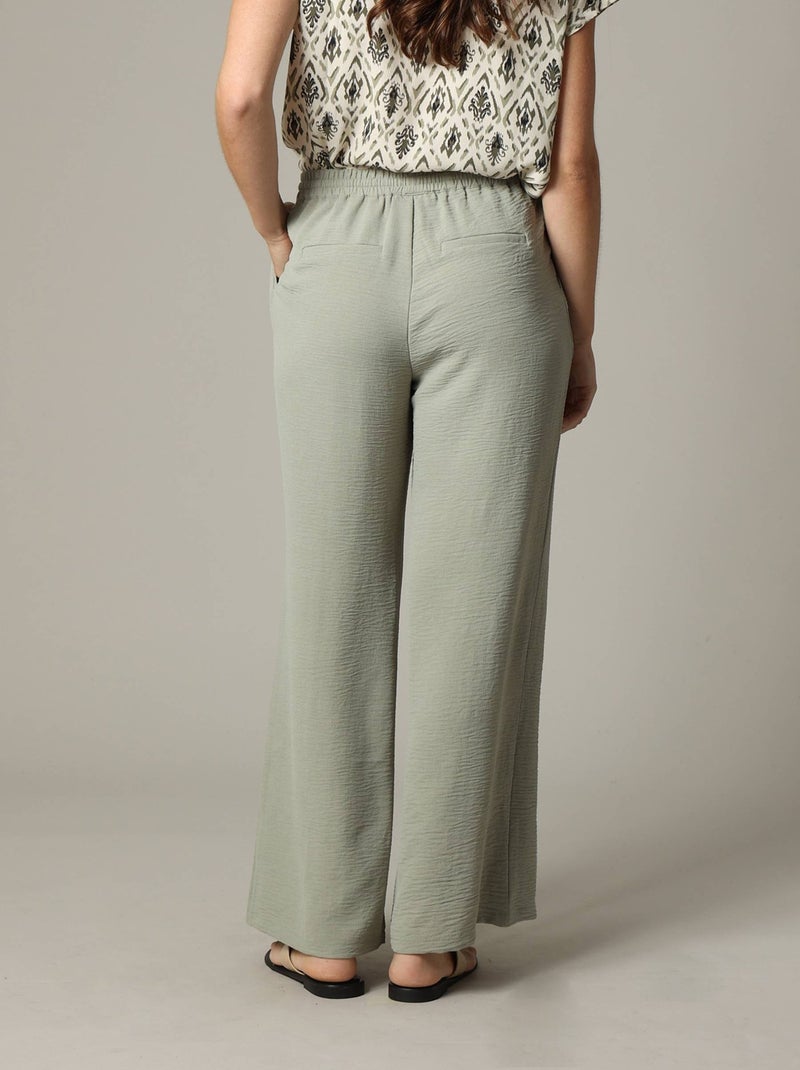 Pantalon fluide en tissu texturé avec taille élastiquée et double couture verticale 'Deeluxe' Vert tilleul - Kiabi