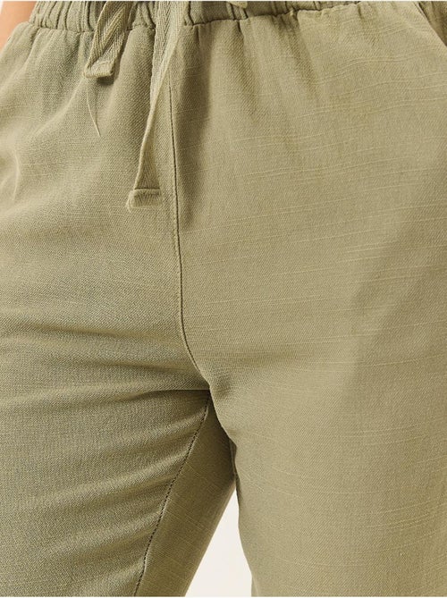 Pantalon fuselé en lin avec poches et ceinture nouée bianco lucci - Kiabi Pantalon fuselé en lin avec poches et ceinture nouée bianco lucci - Kiabi