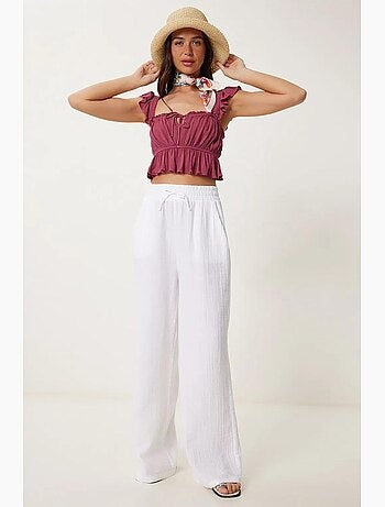 Pantalon jambes larges, taille élastique, cordon de serrage, finitions bordées istanbul