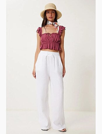 Pantalon jambes larges, taille élastique, cordon de serrage, finitions bordées istanbul