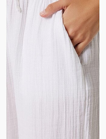Pantalon jambes larges, taille élastique, cordon de serrage, finitions bordées istanbul