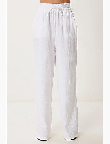 Pantalon jambes larges, taille élastique, cordon de serrage, finitions bordées istanbul