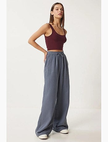 Pantalon jambes larges, taille élastique, cordon de serrage, finitions bordées istanbul