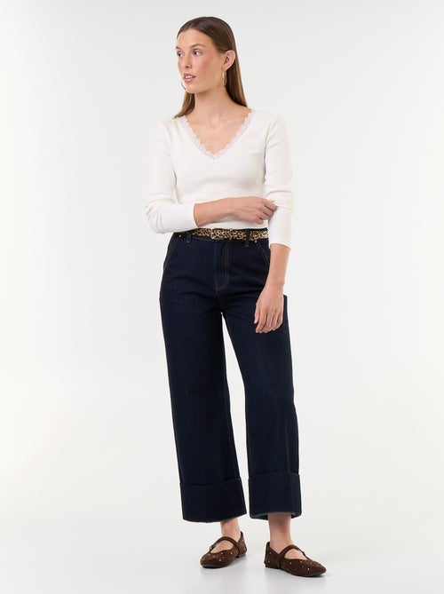 Pantalon jean uni avec larges revers à la base - Kiabi Pantalon jean uni avec larges revers à la base - Kiabi