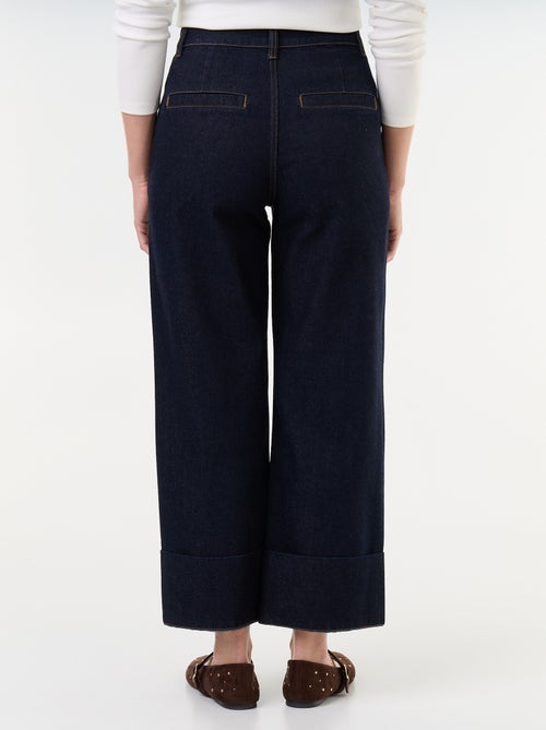 Pantalon jean uni avec larges revers à la base - Kiabi Pantalon jean uni avec larges revers à la base - Kiabi