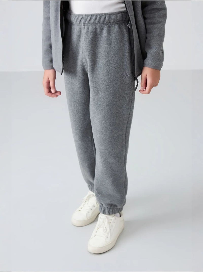 Pantalon jeunesse uni tommy Gris Noir - Kiabi