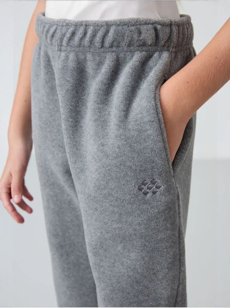 Pantalon jeunesse uni tommy Gris Noir - Kiabi