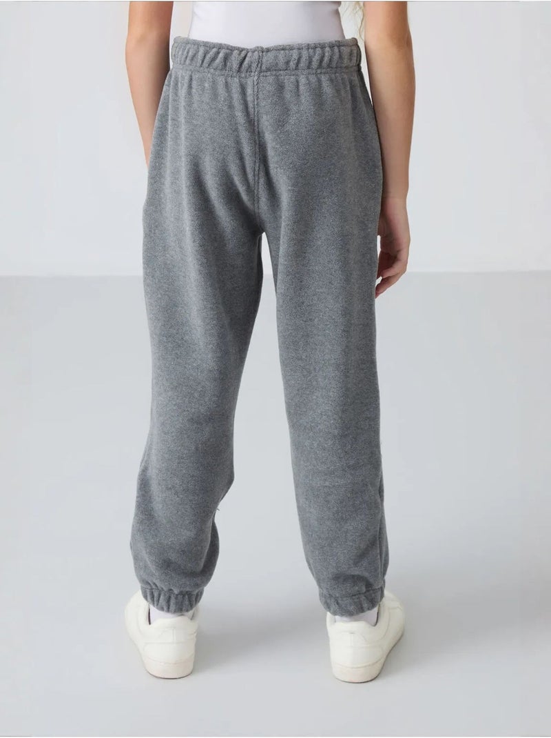 Pantalon jeunesse uni tommy Gris Noir - Kiabi