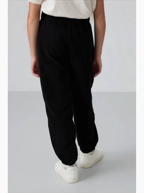 Pantalon jeunesse uni tommy - Kiabi Pantalon jeunesse uni tommy - Kiabi