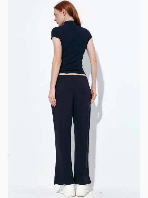 Pantalon jogger en jersey à jambe évasée femme busem - Kiabi Pantalon jogger en jersey à jambe évasée femme busem - Kiabi