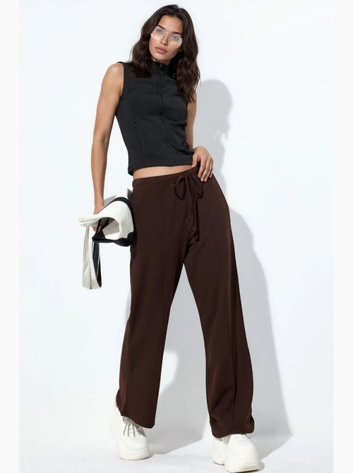 Pantalon jogger en jersey à jambe évasée femme busem - Kiabi Pantalon jogger en jersey à jambe évasée femme busem - Kiabi