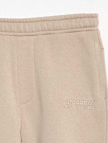 Pantalon jogging avec inscription brodée