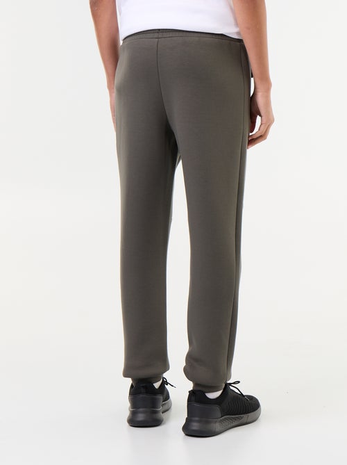 Pantalon jogging avec poches zippées - Kiabi