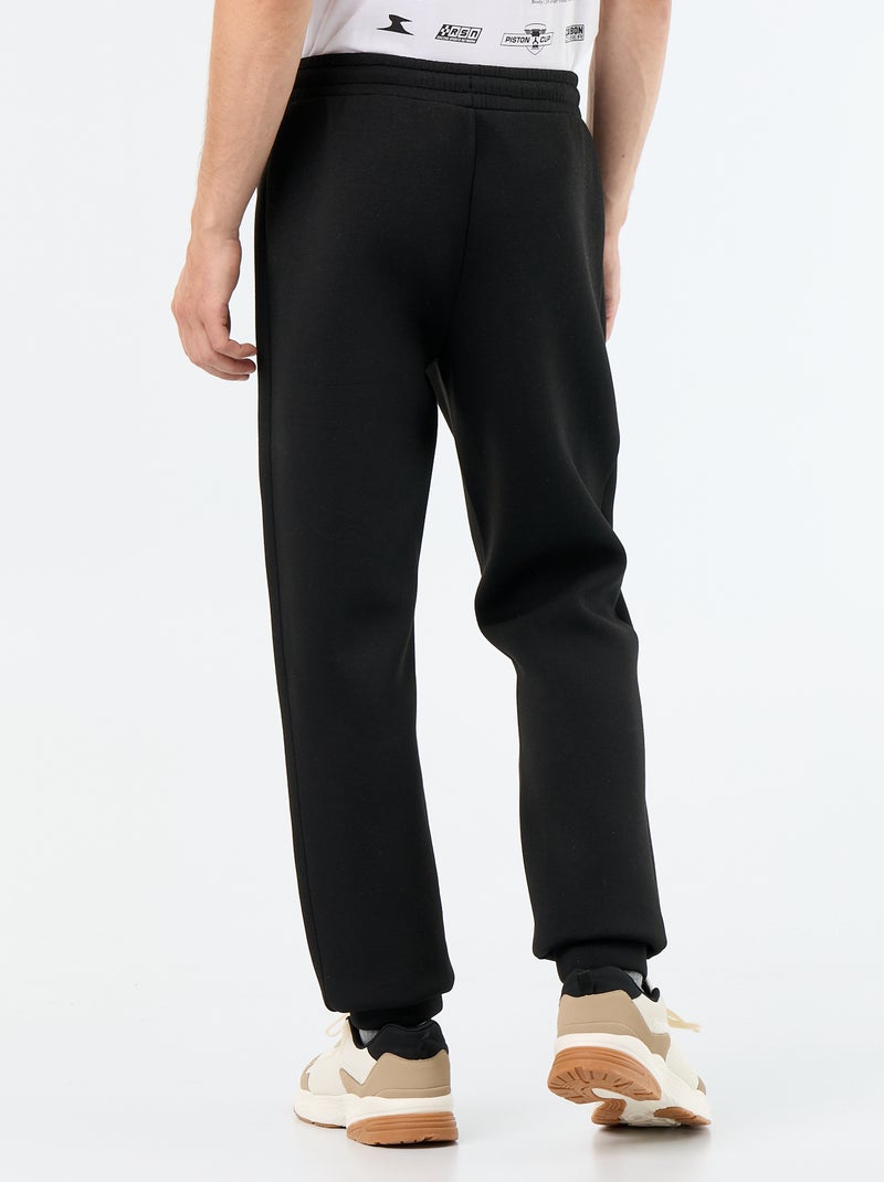 Pantalon jogging avec poches zippées Noir - Kiabi