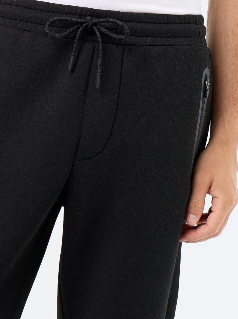 Pantalon jogging avec poches zippées Noir - Kiabi